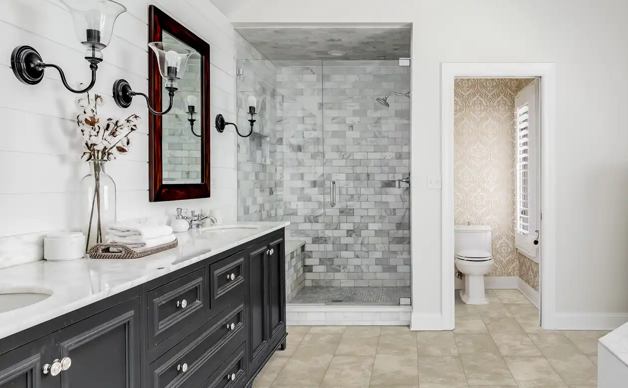Tiled bathroom with grey shower tile. 